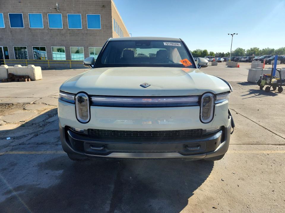 2025 Rivian R1t VIN 7FCTGCAA1SN041349 COPART salvage auction — SIDE, Co - Salvage Title, sold $36,500 on 2026-09-04 (photo 5)