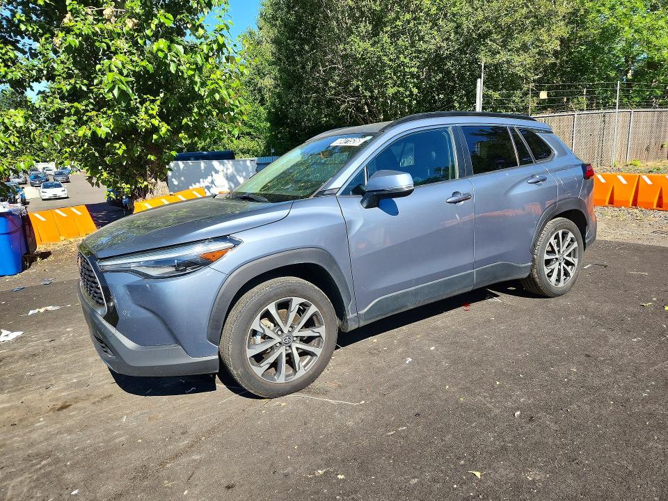 2022 Toyota Corolla cross VIN 7MUDAAAG5NV031464 COPART salvage auction — SIDE, Ca - Certificate Of Title, sold $9,900 on 2026-07-28 (photo 1)