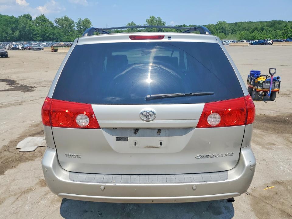 2010 Toyota Sienna VIN 5TDYK4CC0AS334375 COPART salvage auction — FRONT END, NY - MV-907A SALVAGE CERTIFICATE, sold $900 on 2026-07-16 (photo 6)