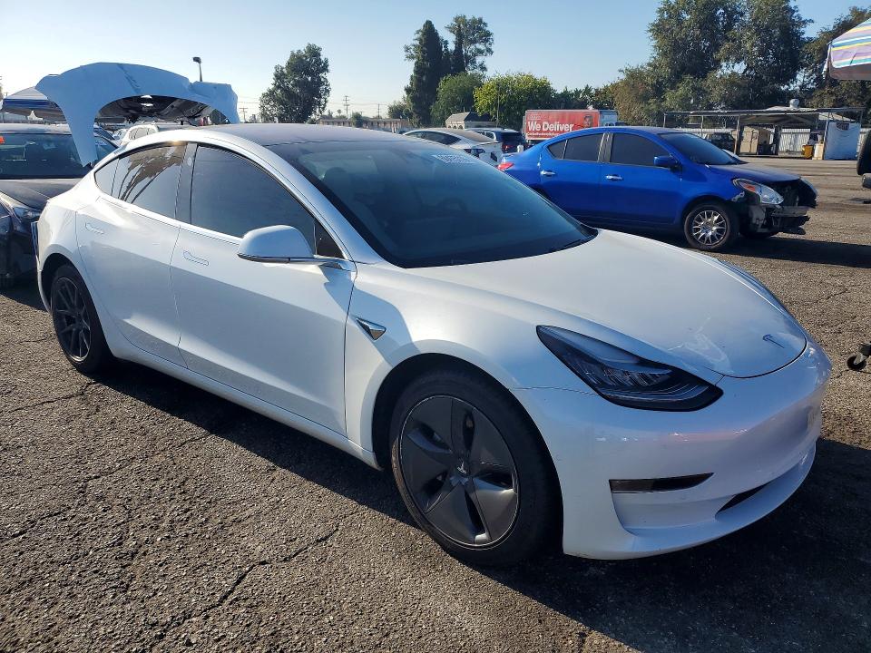 2018 Tesla Model 3 VIN 5YJ3E1EB7JF100047 COPART salvage auction — REAR END, Ca - Salvage Certificate, sold $5,500 on 2026-07-28 (photo 4)