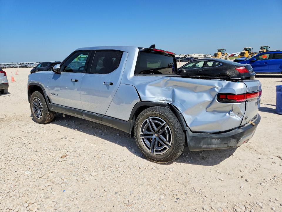 2025 Rivian R1t VIN 7FCTGBAA8SN035090 COPART salvage auction — REAR END, TX - SALVAGE VEHICLE TITLE (P), sold $17,700 on 2026-08-13 (photo 2)