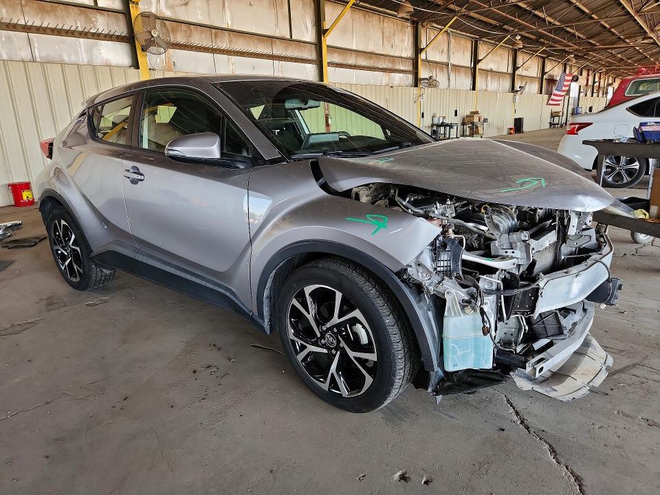 2019 Toyota C-hr VIN JTNKHMBXXK1047984 COPART salvage auction — FRONT END, AZ - CERT OF TITLE - SALVAGE, sold $4,150 on 2026-07-27 (photo 4)