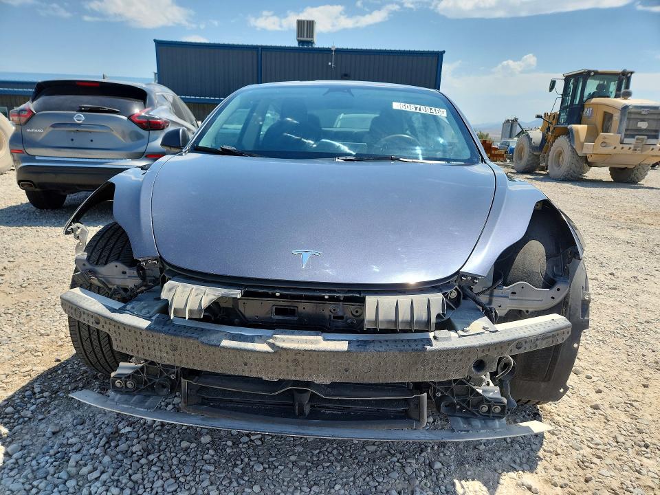 2023 Tesla Model 3 VIN 5YJ3E1EA7PF454554 COPART salvage auction — ALL OVER, Ut - Certificate Of Title, sold $125 on 2026-07-22 (photo 5)