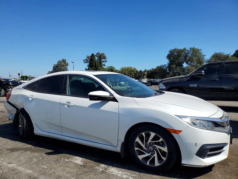 2018 Honda Civic VIN 19XFC2F75JE207235 COPART salvage auction — REAR END, Ca - Dis/Dlr/Exp Clean W/Salv Hist, sold $3,750 on 2026-08-07 (photo 4)
