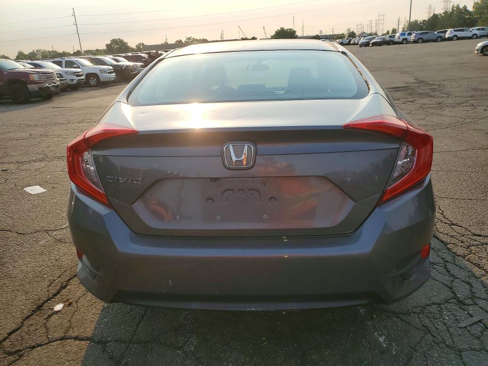 2016 Honda VIN 19XFC2F50GE011288 COPART salvage auction — SIDE, Co - Public - Salvage Title, sold $3,150 on 2026-07-09 (photo 6)