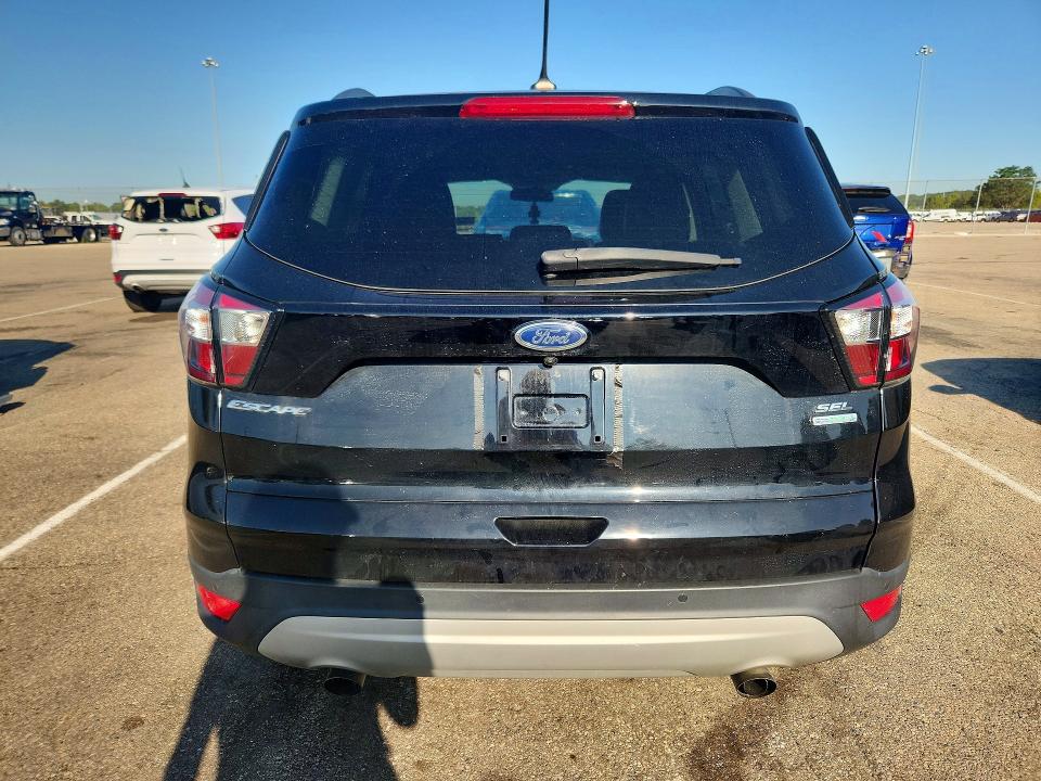 2018 Ford Escape VIN 1FMCU0HD2JUA70503 COPART salvage auction — MINOR DENT/SCRATCHES, Oh - Cert Of Title-Repossession, sold $7,000 on 2026-08-26 (photo 6)