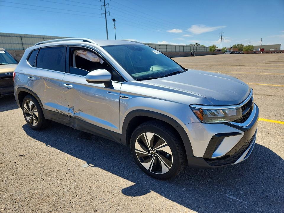 2024 Volkswagen Taos VIN 3VVUX7B20RM067777 COPART salvage auction — SIDE, Nm - Cert Of Title-Salvage, sold $11,100 on 2026-08-17 (photo 4)