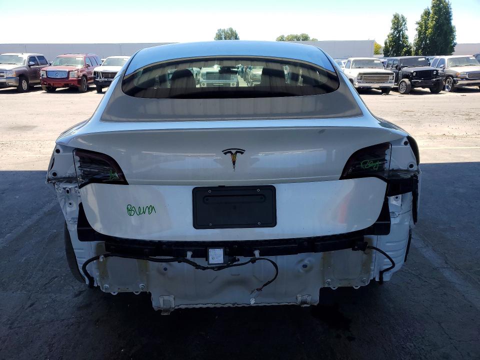 2023 Tesla Model 3 VIN 5YJ3E1EA7PF541256 COPART salvage auction — REAR END, CA - CERTIFICATE OF TITLE (P), sold $14,600 on 2026-07-13 (photo 6)