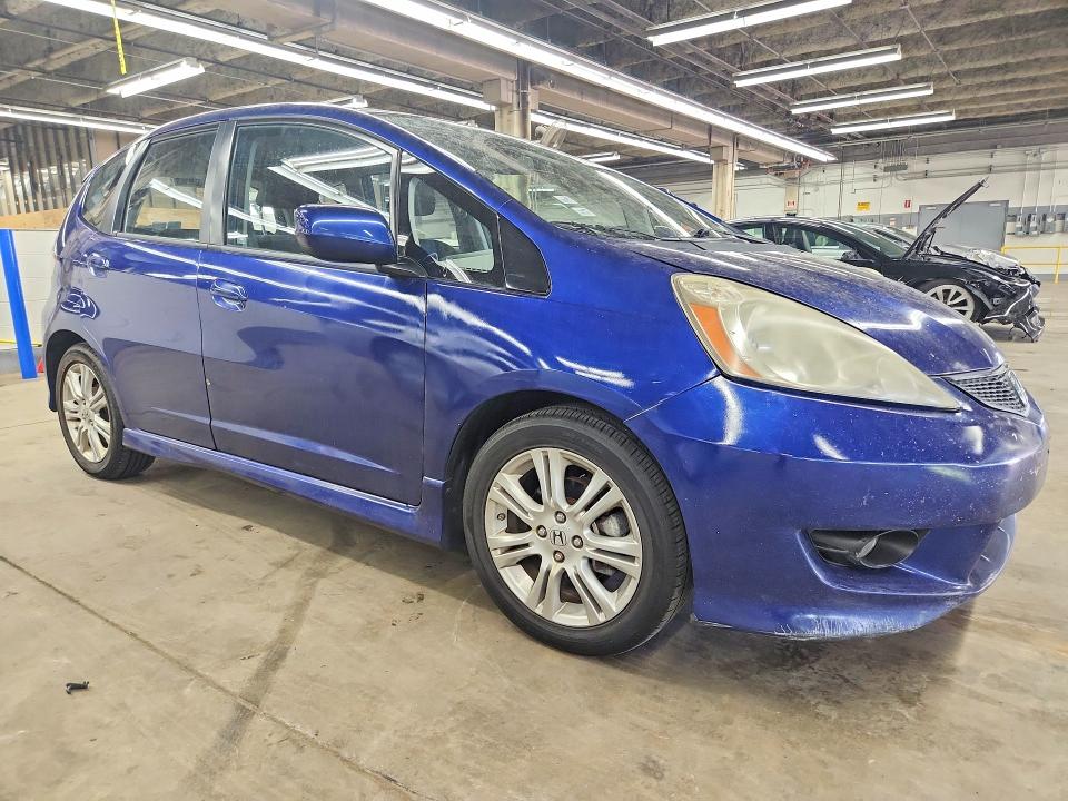 2010 Honda Fit VIN JHMGE8H48AC025023 COPART salvage auction — MINOR DENT/SCRATCHES, Il - Cert Of Title-Rebuilt, sold $1,950 on 2026-07-27 (photo 4)