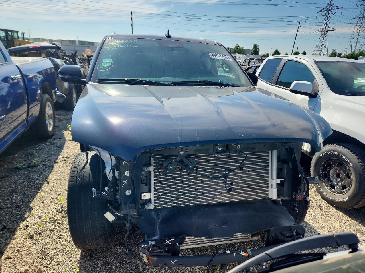 2024 Lincoln Navigator VIN 5LMJJ3NG6REL12471 COPART salvage auction — Front End, IL - SALVAGE CERTIFICATE, sold $24,800 on 2026-07-10 (photo 5)