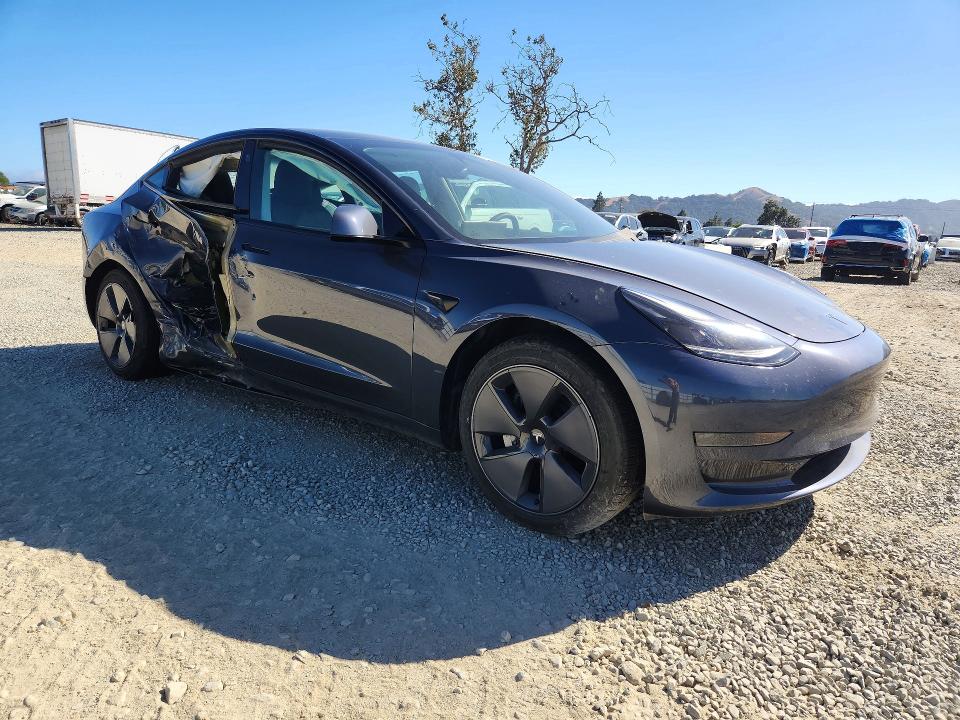 2023 Tesla Model 3 VIN 5YJ3E1EA6PF417513 COPART salvage auction — SIDE, Ca - Salvage Certificate, sold $6,900 on 2026-07-14 (photo 4)