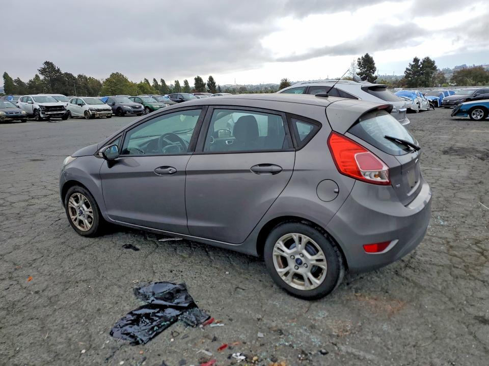 2014 Ford Fiesta VIN 3FADP4EJ8EM125313 COPART salvage auction — MINOR DENT/SCRATCHES, Ca - Dis/Dlr/Exp Only Clean Title, sold $425 on 2026-07-10 (photo 2)