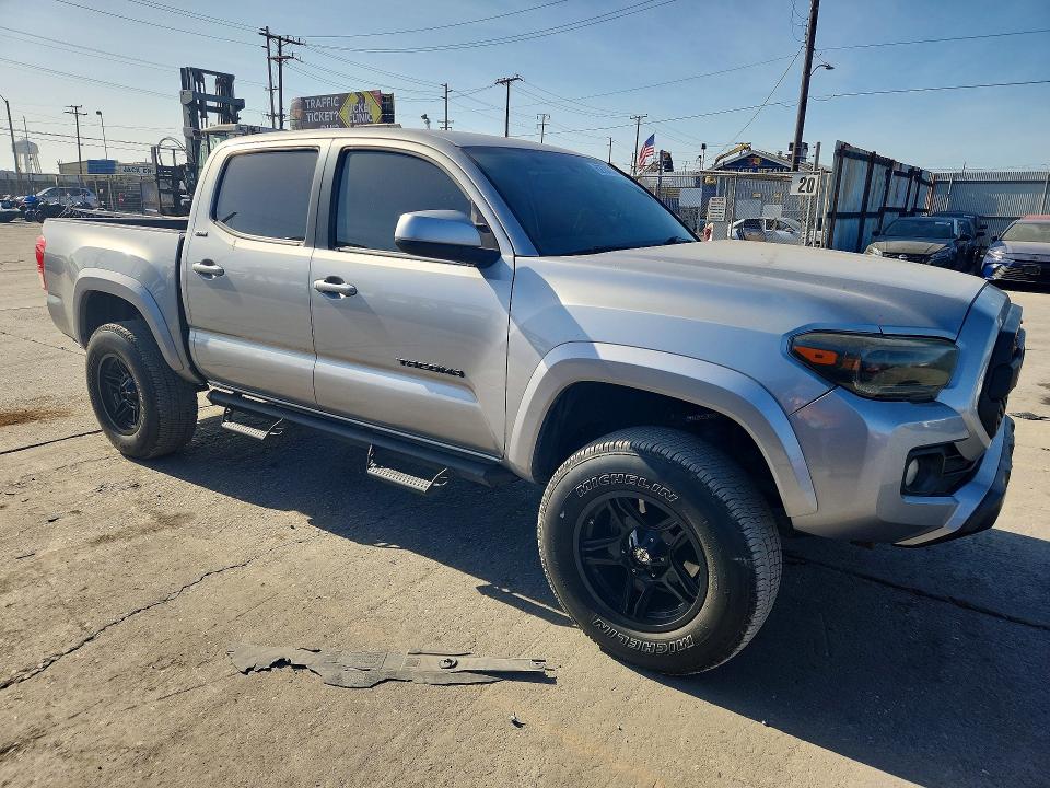 2017 Toyota Tacoma VIN 3TMAZ5CN9HM041704 COPART salvage auction — MINOR DENT/SCRATCHES, AZ - CERT OF TITLE-RESTORED SALVAGE, sold $12,700 on 2026-08-24 (photo 4)
