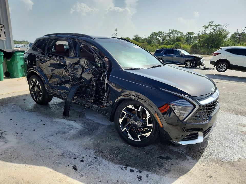 2025 Kia Sportage VIN 5XYK53DF2SG320685 COPART salvage auction — SIDE, Fl - Certificate Of Title, sold $90 on 2026-07-28 (photo 4)