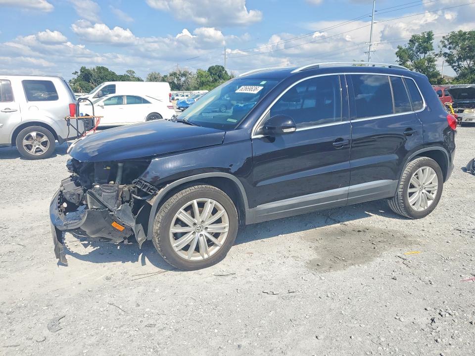 2015 Volkswagen Tiguan VIN WVGAV7AX6FW509764 COPART salvage auction — FRONT END, FL - CERT OF TITLE SLVG REBUILDABLE, sold $1,300 on 2026-08-07 (photo 1)