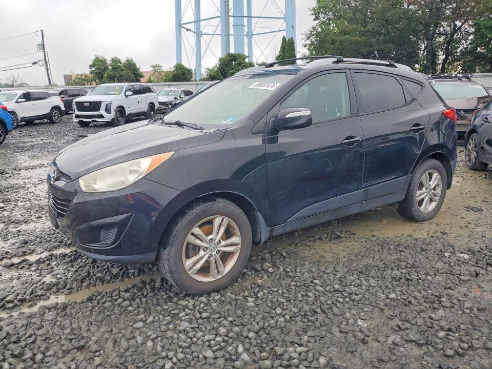 2012 Hyundai Tucson VIN KM8JU3AC7CU512768 COPART salvage auction — MECHANICAL, NJ - CERTIFICATE OF TITLE, sold $1,550 on 2026-07-08 (photo 1)