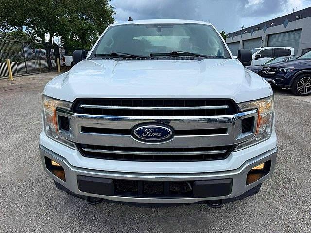 2020 Ford F-150 lightning VIN 1FTFW1E52LFA00232 COPART salvage auction — MINOR DENT/SCRATCHES, FL - CERTIFICATE OF TITLE (P), sold $14,200 on 2026-09-11 (photo 5)