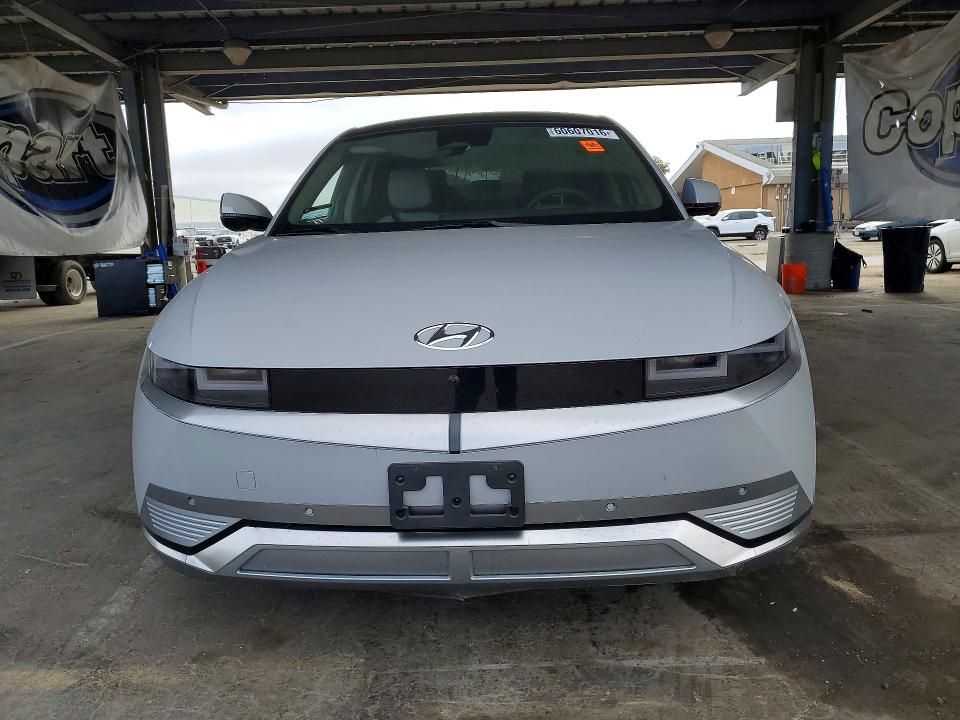 2023 Hyundai Ioniq 5 VIN KM8KR4AE8PU209081 COPART salvage auction — BURN, Ca - Salvage Certificate, sold $15 on 2026-07-30 (photo 5)