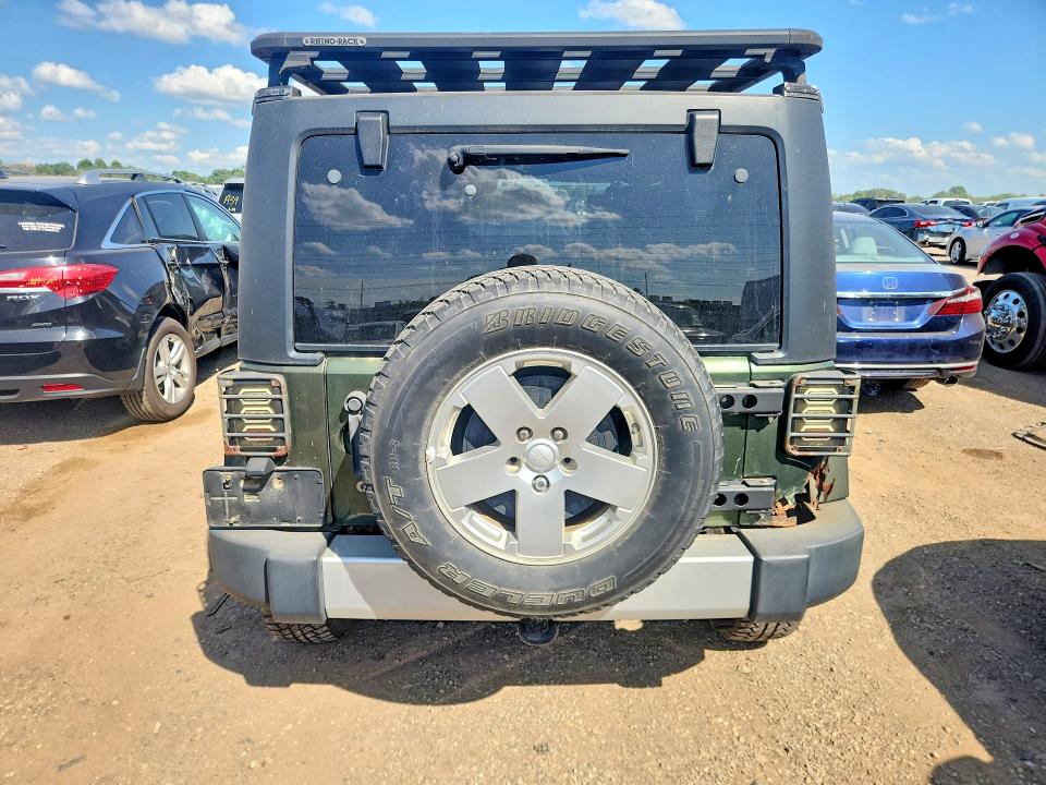 2008 Jeep Wrangler unlimited VIN 1J4GA59198L520500 COPART salvage auction — NORMAL WEAR, IN - CERTIFICATE OF TITLE, sold $2,472 on 2026-07-09 (photo 6)