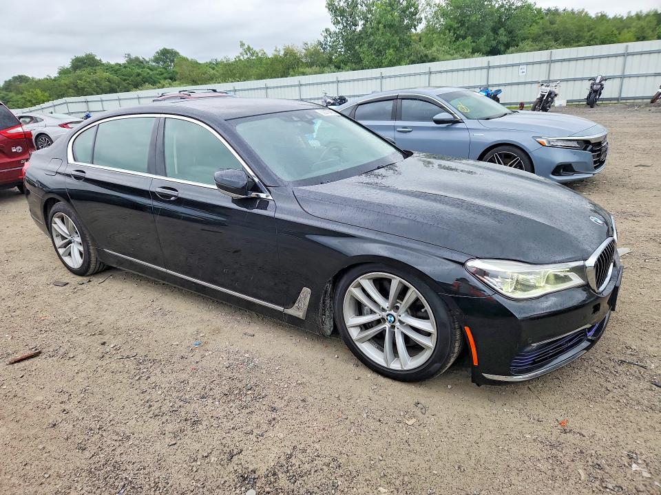2016 BMW 7er VIN WBA7F2C52GG419238 COPART salvage auction — MINOR DENT/SCRATCHES, MA - CERTIFICATE OF TITLE, sold $4,150 on 2026-08-19 (photo 4)