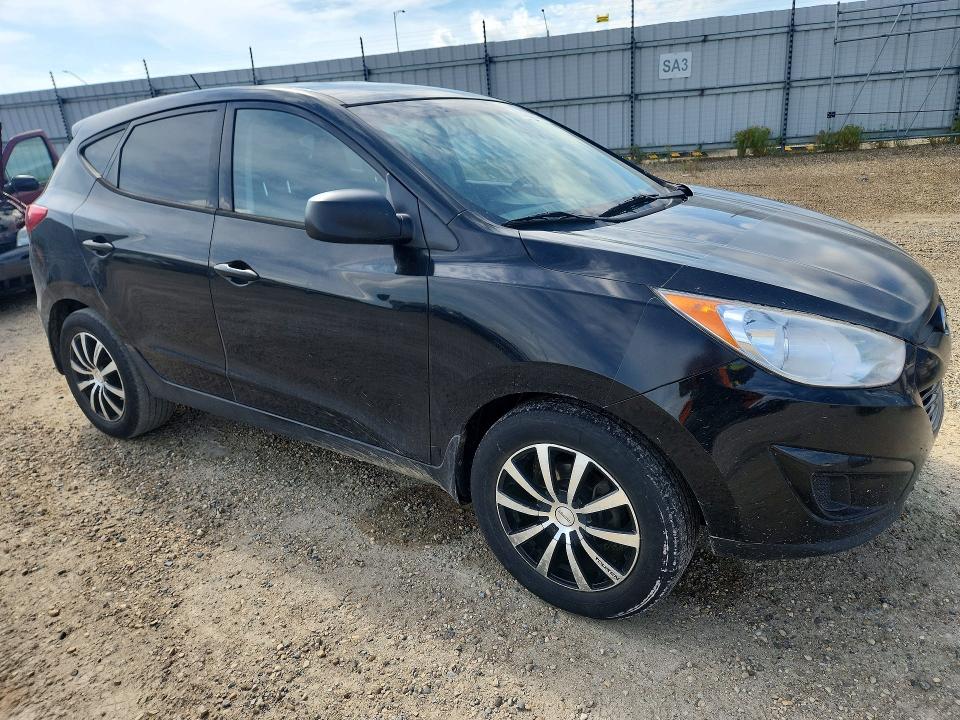 2011 Hyundai Tucson VIN KM8JT3AC3BU257814 COPART salvage auction — FRONT END, AB - BOS - SALVAGE, sold $150 on 2026-07-16 (photo 4)