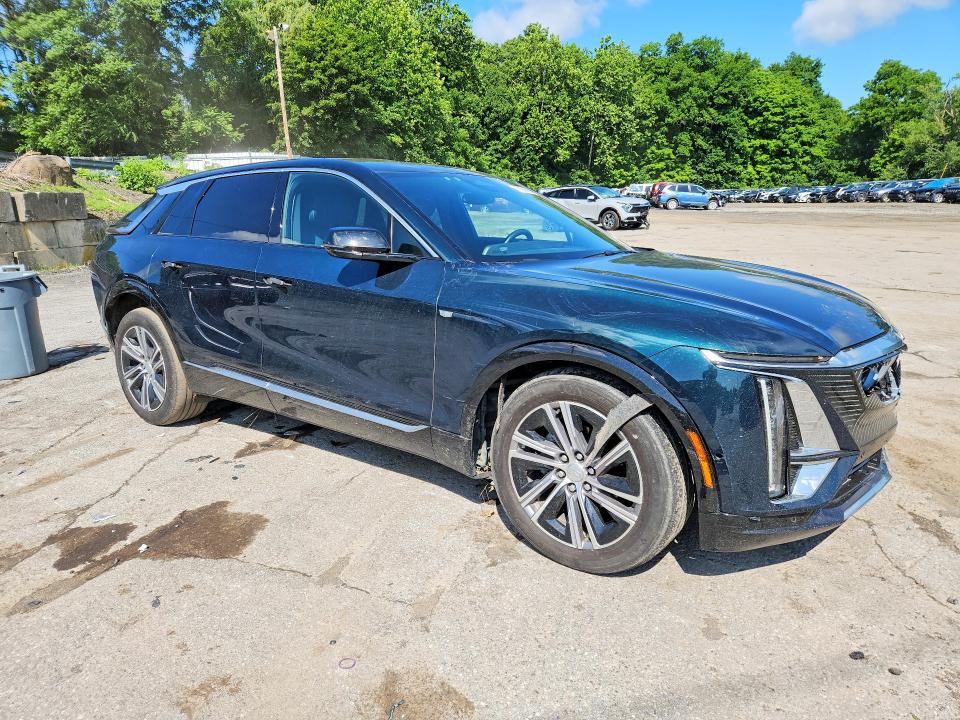 2024 Cadillac Lyriq VIN 1GYKPPRL5RZ139022 COPART salvage auction — FRONT END, Ny - Mv-907A Salvage Certificate, sold $16,700 on 2026-08-06 (photo 4)