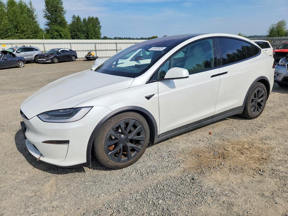 2022 Tesla Model x VIN 7SAXCAE5XNF358234 COPART salvage auction — SIDE, WA - CERT OF OWNERSHIP-REBUILT, sold $17,400 on 2026-07-27 (photo 1)