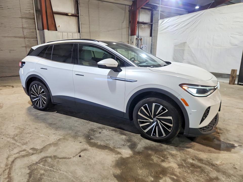 2024 Volkswagen Id.4 VIN 1V25MPE85RC017422 COPART salvage auction — SIDE, Ma - Cert Of Title-Salvage, sold $13,100 on 2026-09-03 (photo 4)