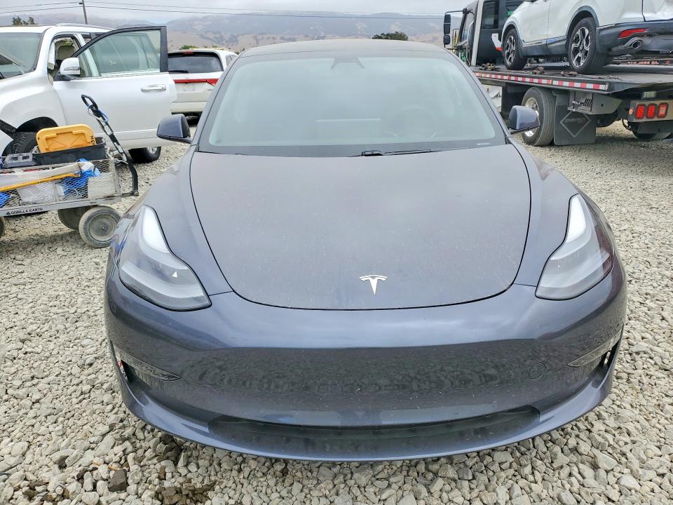 2021 Tesla Model 3 VIN 5YJ3E1EAXMF998770 COPART salvage auction — REAR END, Ca - Salvage Certificate, sold $7,200 on 2026-07-14 (photo 5)