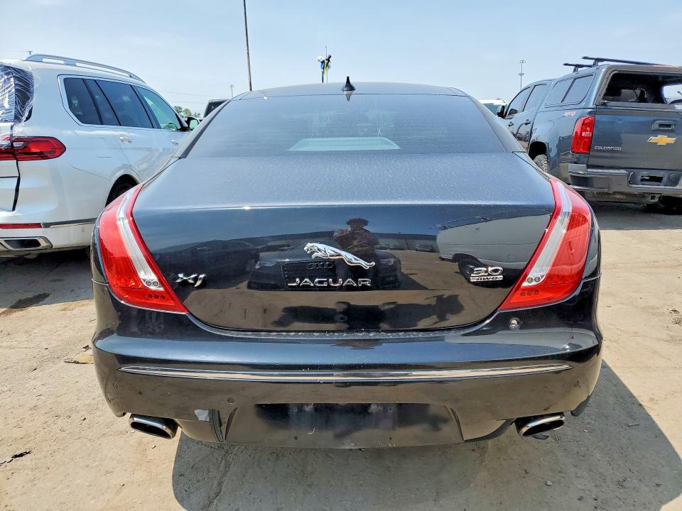 2015 Jaguar Xj VIN SAJWJ1CD5F8V74908 COPART salvage auction — UNDERCARRIAGE, MI - CERTIFICATE OF TITLE, sold $400 on 2026-07-21 (photo 6)