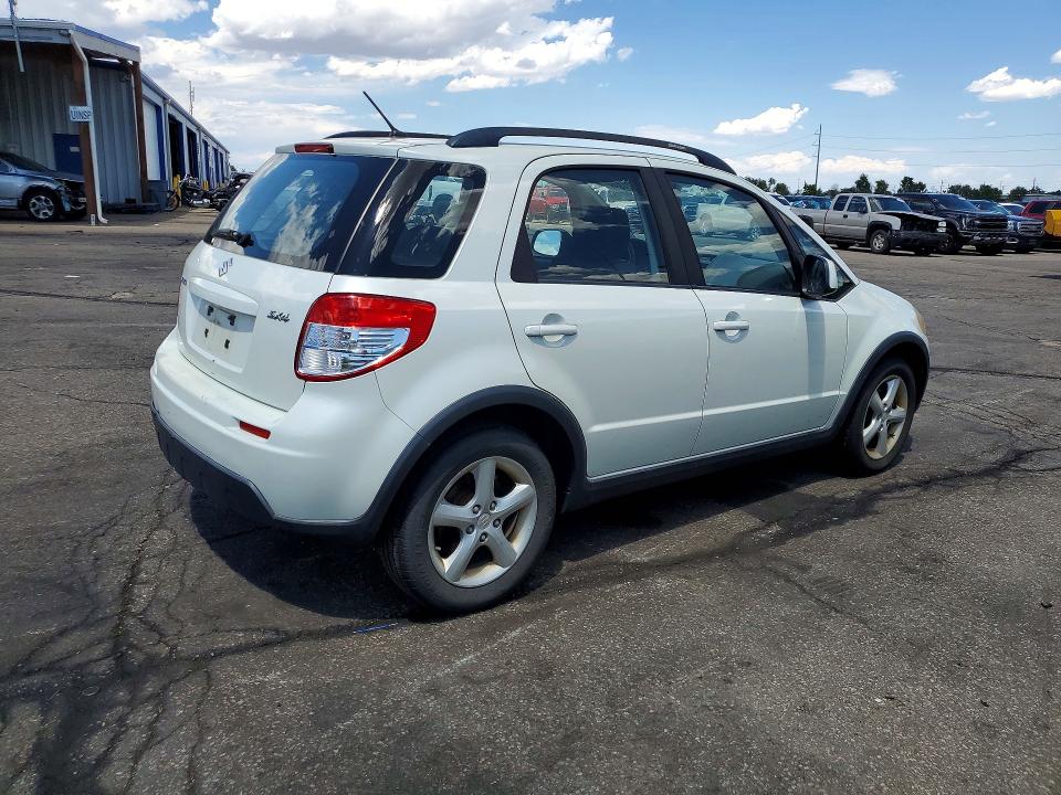 2009 Suzuki Sx4 VIN JS2YA413096201610 COPART salvage auction — HAIL, CO - DIS/DLR/EXP ONLY CLEAN TITLE, sold $825 on 2026-09-10 (photo 3)