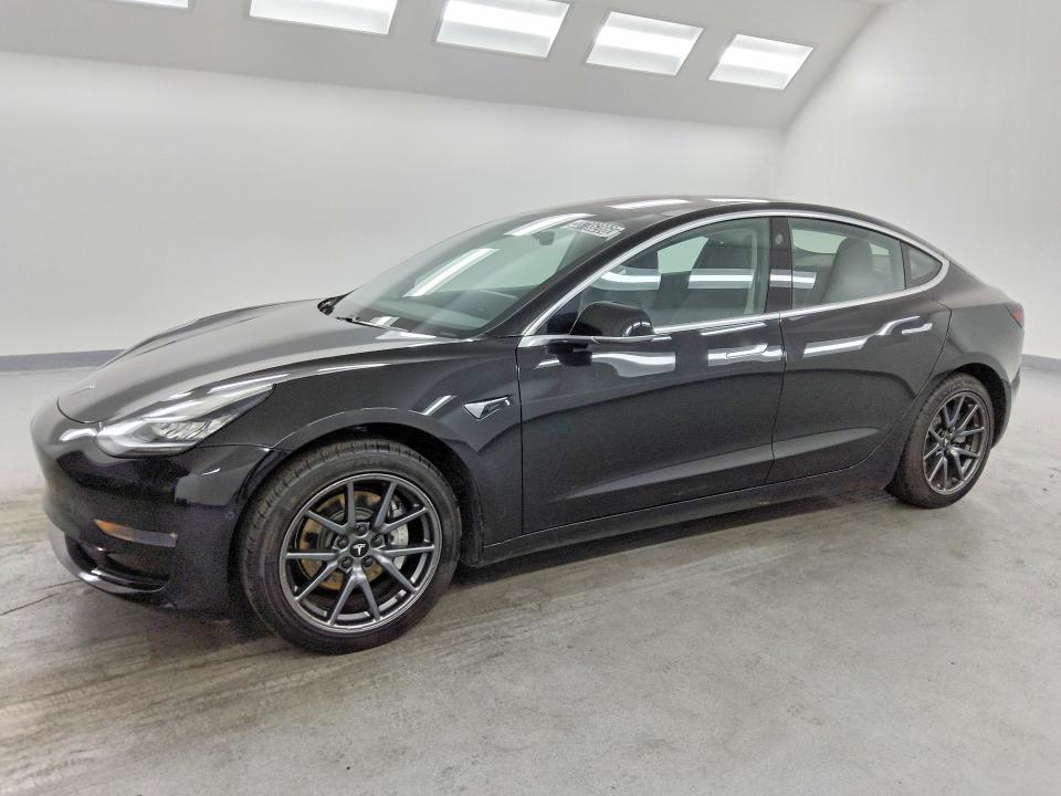 2018 Tesla Model 3 VIN 5YJ3E1EA8JF013863 COPART salvage auction — MINOR DENT/SCRATCHES, CA - CERTIFICATE OF TITLE, sold $14,700 on 2026-07-23 (photo 1)