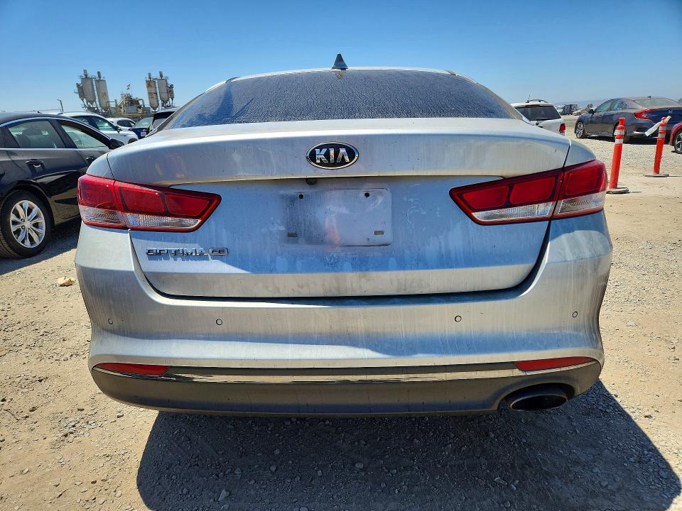 2019 Kia Optima VIN 5XXGT4L37KG326950 COPART salvage auction — MINOR DENT/SCRATCHES, Az - Dealer Only Rebuilt Salvage, sold $1,850 on 2026-07-31 (photo 6)