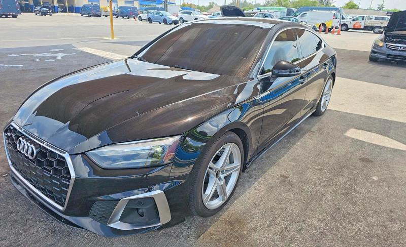 2021 Audi A5 VIN WAUDACF59MA056857 COPART salvage auction — NORMAL WEAR, FL - CERTIFICATE OF TITLE (P), sold $11,600 on 2026-08-24 (photo 2)