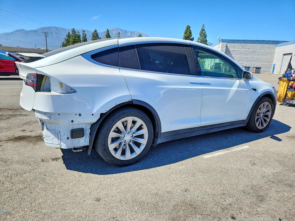 2018 Tesla Model x VIN 5YJXCAE29JF124180 COPART salvage auction — REAR END, Salvage Title, sold $9,600 on 2026-08-20 (photo 3)
