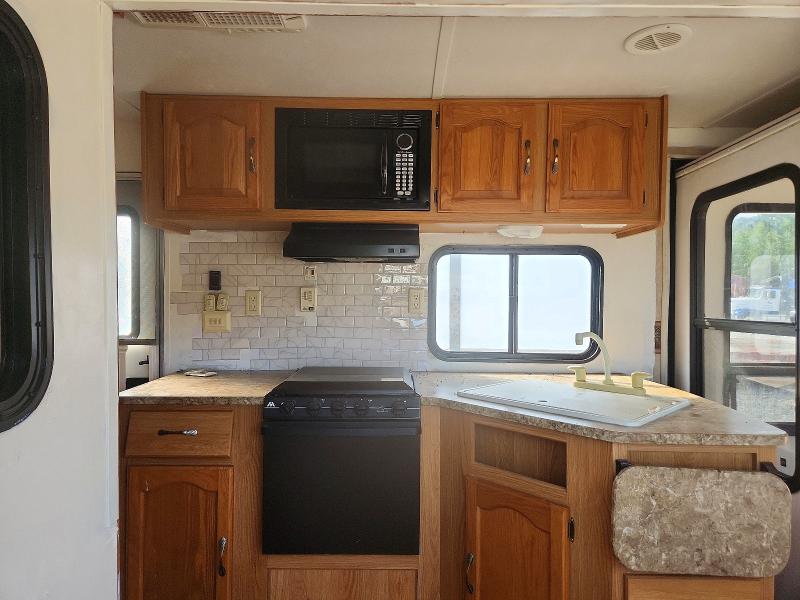 2011 VIN 4YDT31120B3105114 COPART salvage auction — NORMAL WEAR, CT, sold $1,750 on 2026-09-15 (photo 5)