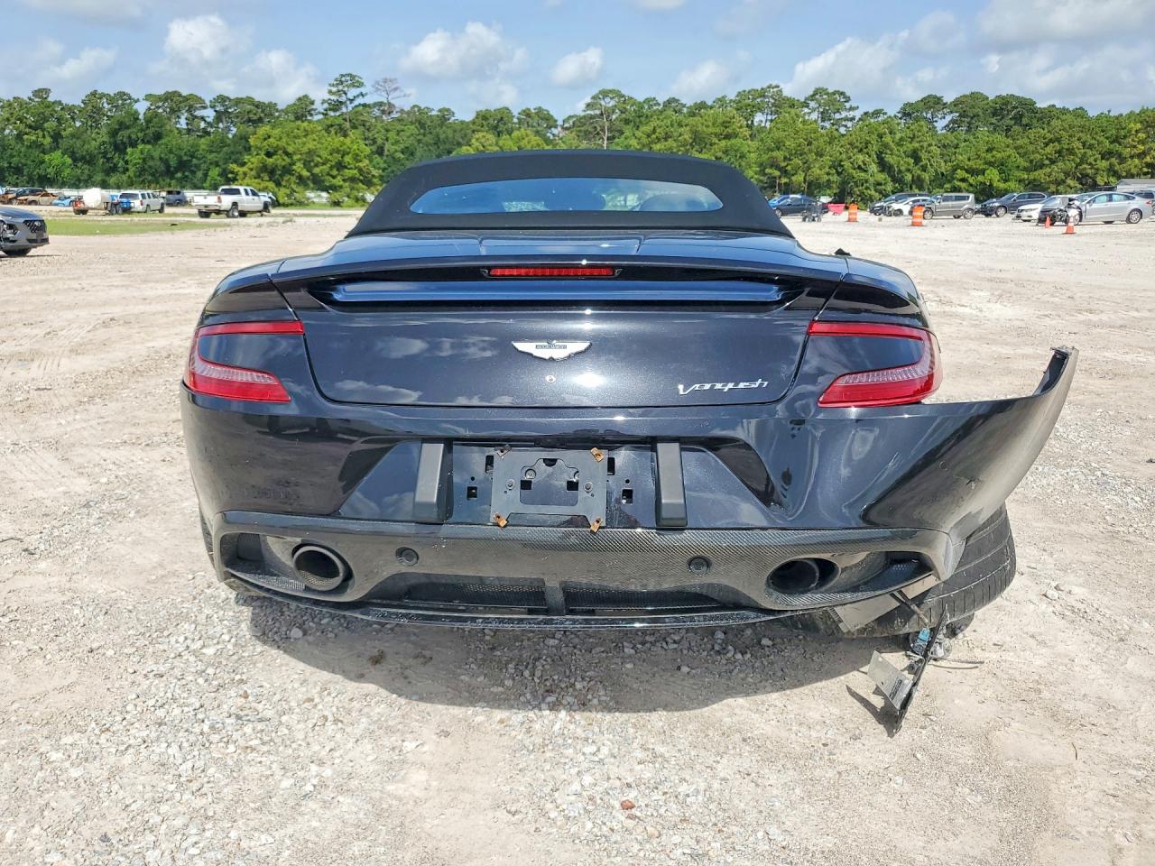 2014 Aston martin VIN SCFPDCGP7EGK01529 COPART salvage auction — Front End, TX - SALVAGE VEHICLE TITLE, sold $16,300 on 2026-08-25 (photo 6)