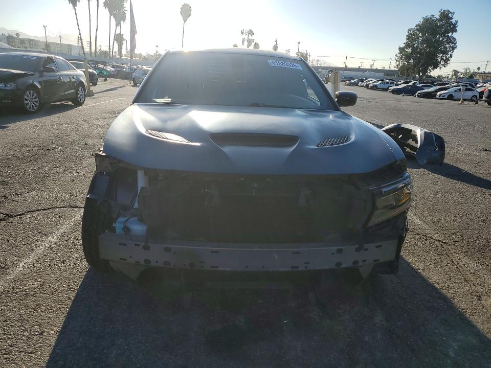 2023 Dodge Charger VIN 2C3CDXGJ3PH584381 COPART salvage auction — SIDE, Salvage Title, sold $13,700 on 2026-08-25 (photo 5)