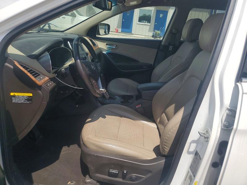 2014 Hyundai Santa fe VIN 5XYZU3LB1EG220582 COPART salvage auction — MINOR DENT/SCRATCHES, Fl - Certificate Of Title, sold $2,050 on 2026-07-31 (photo 7)