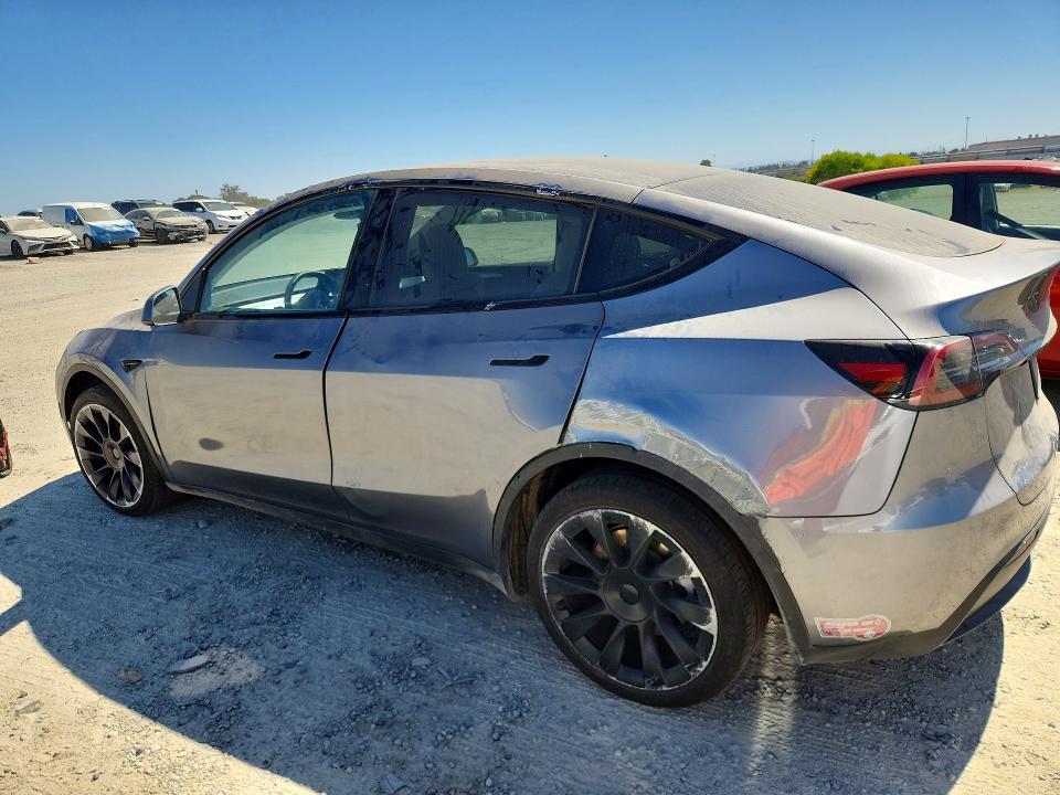 2025 Tesla Model y VIN 7SAYGAEE6SF219870 COPART salvage auction — REAR END, Ca - Salvage Certificate (P), sold $8,700 on 2026-07-14 (photo 2)