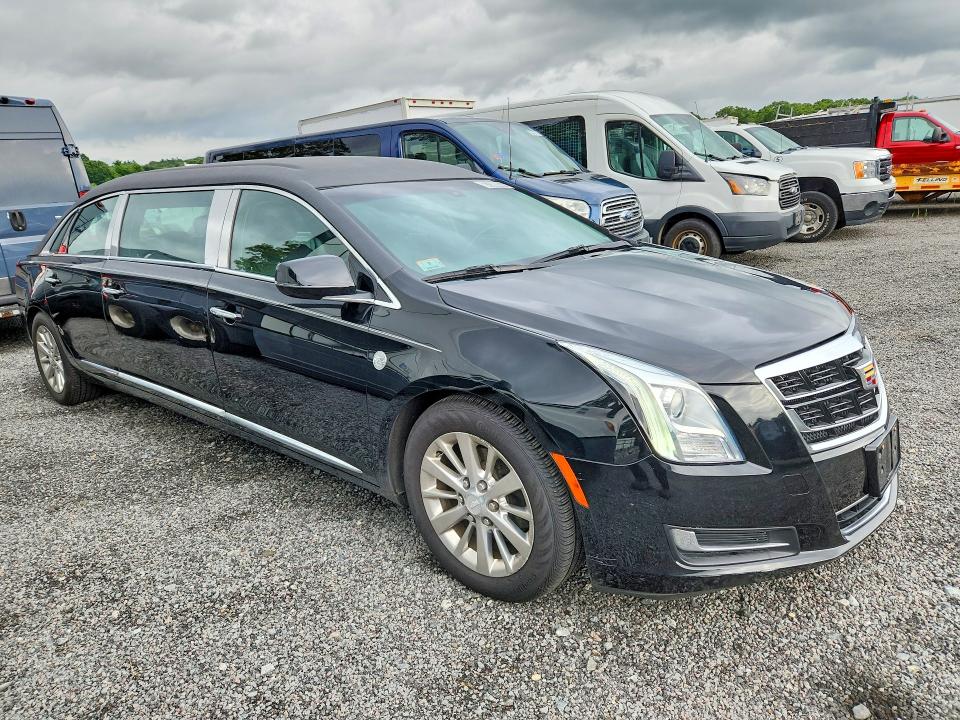 2017 Cadillac Xts VIN 2GEXG6U30H9550339 COPART salvage auction — MINOR DENT/SCRATCHES, MA - CERTIFICATE OF TITLE, sold $9,000 on 2026-08-11 (photo 4)
