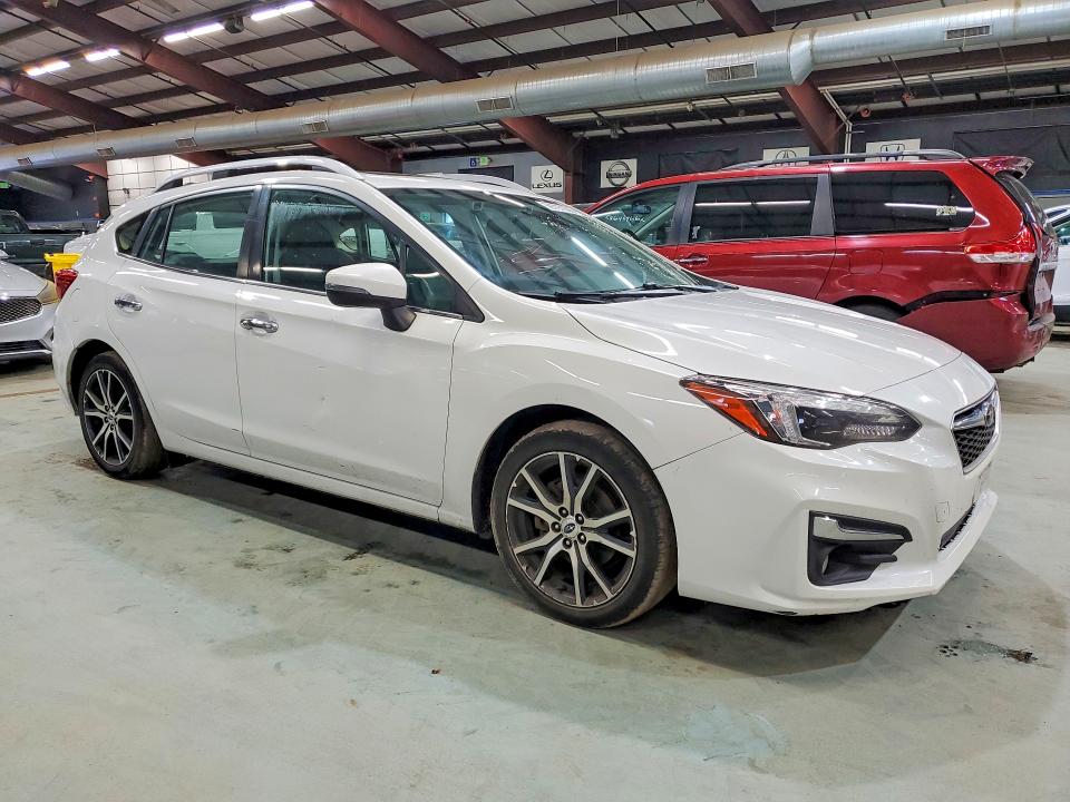 2017 Subaru Impreza VIN 4S3GTAU69H3749996 COPART salvage auction — MINOR DENT/SCRATCHES, Salvage Title, sold $1,400 on 2026-07-23 (photo 4)