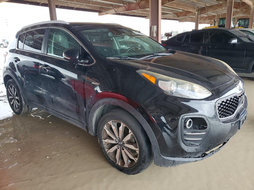 2017 Kia Sportage VIN KNDPNCAC4H7229486 COPART salvage auction — SIDE, Tx - Certificate Of Title, sold $2,700 on 2026-07-17 (photo 4)
