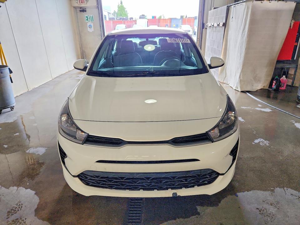 2023 Kia Rio VIN 3KPA25AD5PE613584 COPART salvage auction — NORMAL WEAR, AK - CERTIFICATE OF VEHICLE TITLE, sold $7,200 on 2026-07-28 (photo 5)