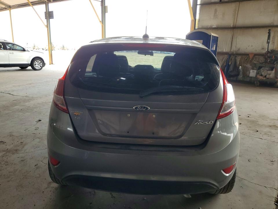 2014 Ford Fiesta VIN 3FADP4EJ9EM182989 COPART salvage auction — NORMAL WEAR, AZ - CERTIFICATE OF TITLE, sold $1,100 on 2026-07-22 (photo 6)