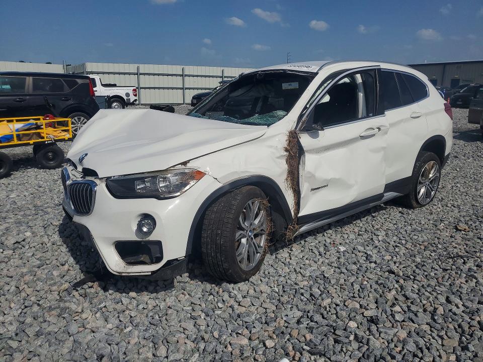 2017 BMW X1 VIN WBXHT3C36H5F73989 COPART salvage auction — ROLLOVER, FL - CERT OF TITLE SLVG REBUILDABLE, sold $750 on 2026-07-31 (photo 1)