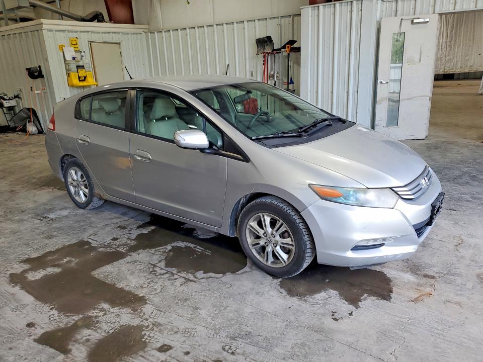 2010 Honda Insight VIN JHMZE2H77AS008333 COPART salvage auction — NORMAL WEAR, Ny - Certificate Of Title, sold $300 on 2026-07-20 (photo 4)