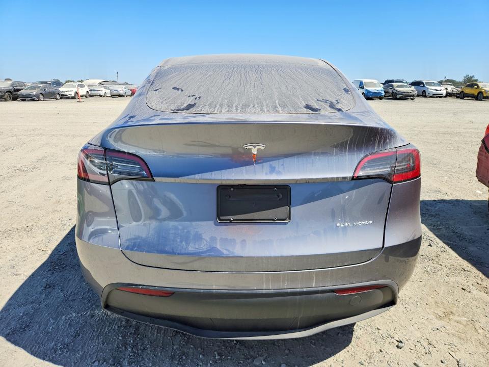 2025 Tesla Model y VIN 7SAYGAEE6SF219870 COPART salvage auction — REAR END, Ca - Salvage Certificate (P), sold $8,700 on 2026-07-14 (photo 6)