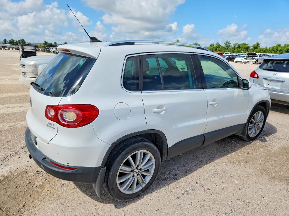 2009 Volkswagen Tiguan VIN WVGBV75N39W521811 COPART salvage auction — NORMAL WEAR, TX - CERT OF TITLE-REBUILT SALVAGE, sold $825 on 2026-07-14 (photo 3)