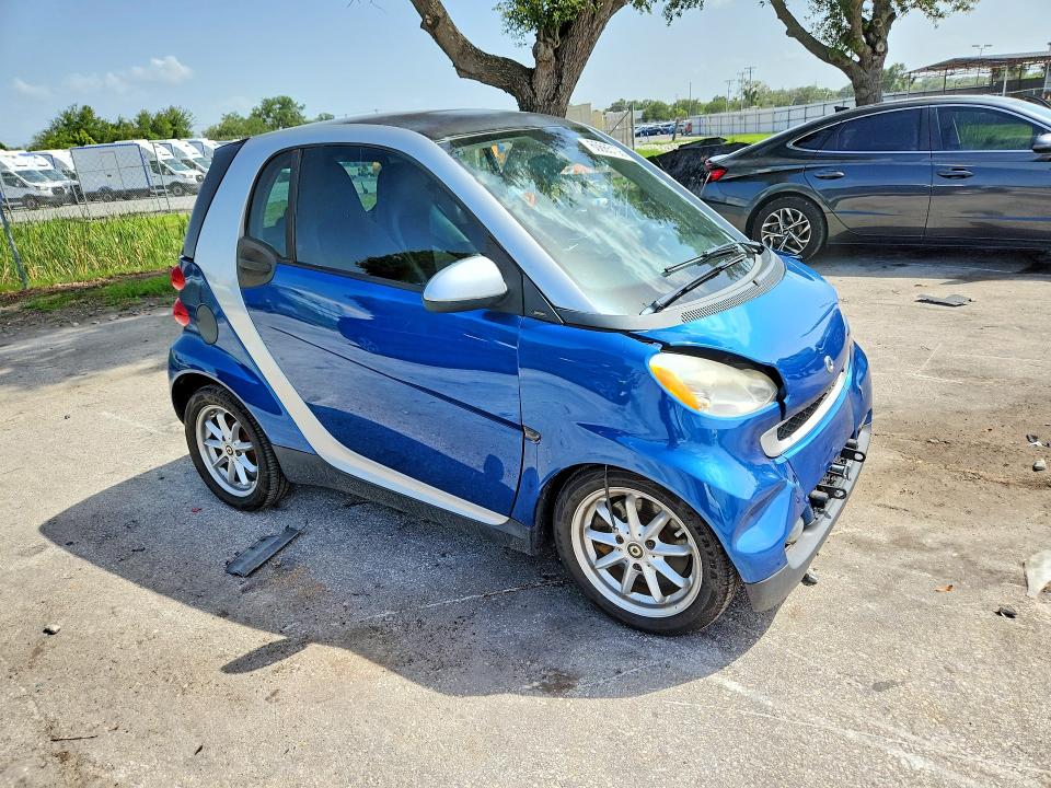 2009 Smart Fortwo VIN WMEEJ31X59K254712 COPART salvage auction — FRONT END, FL - CERT OF TITLE SLVG REBUILDABLE, sold $15 on 2026-07-21 (photo 4)